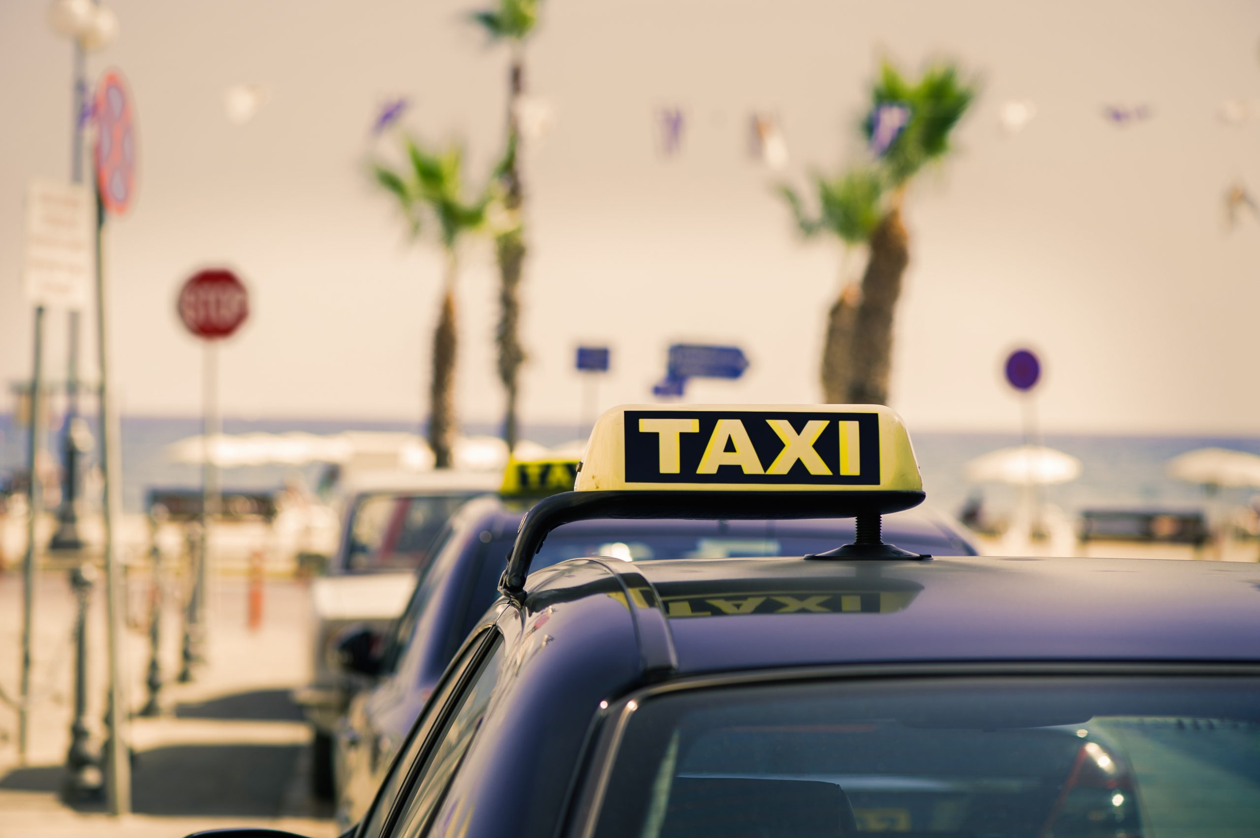 Taxi,Car,On,The,Street,Of,Larnaca.,Cyprus.,Luminous,Taxi